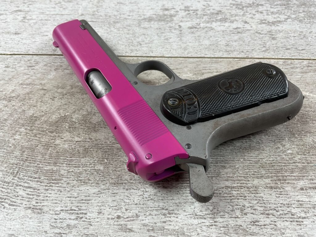 COLT 1903 POCKER HAMMER 38ACP, 1908 MFR FRAME, PINK UPPER, JAMES EARL JONES COLLECTION #5-10748