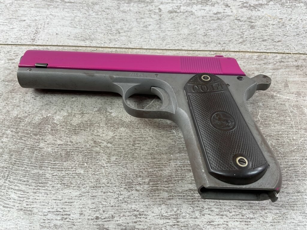 COLT 1903 POCKER HAMMER 38ACP, 1908 MFR FRAME, PINK UPPER, JAMES EARL JONES COLLECTION #5-10748