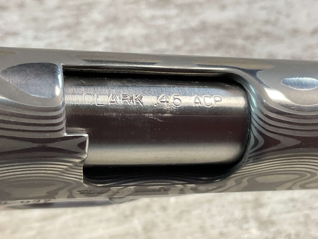 CLARK CUSTOM 50TH ANNIVERSARY MILLENNIUM MELTDOWN .45ACP SEMI AUTO PISTOL, JAMES EARL JONES COLLECTION #5-10768