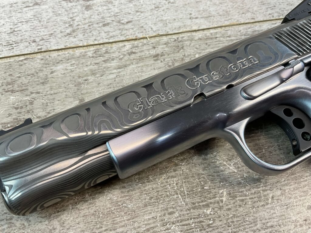 CLARK CUSTOM 50TH ANNIVERSARY MILLENNIUM MELTDOWN .45ACP SEMI AUTO PISTOL, JAMES EARL JONES COLLECTION #5-10768