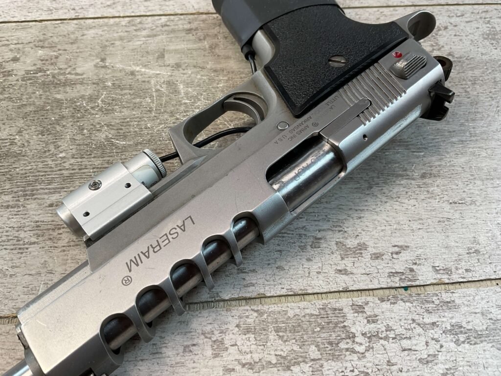 LASERAIM ARMS SERIES III .45 ACP SEMI AUTO STAINLESS PISTOL, JAMES EARL JONES COLLECTION #5-10797