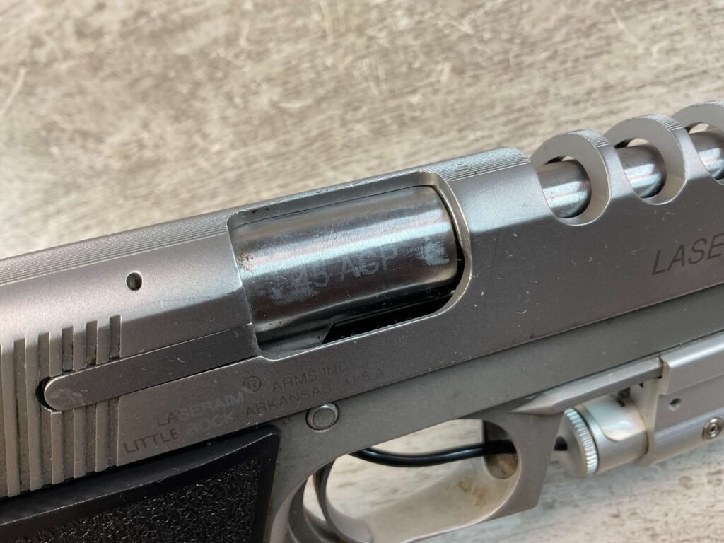 LASERAIM ARMS SERIES III .45 ACP SEMI AUTO STAINLESS PISTOL, JAMES EARL JONES COLLECTION #5-10797