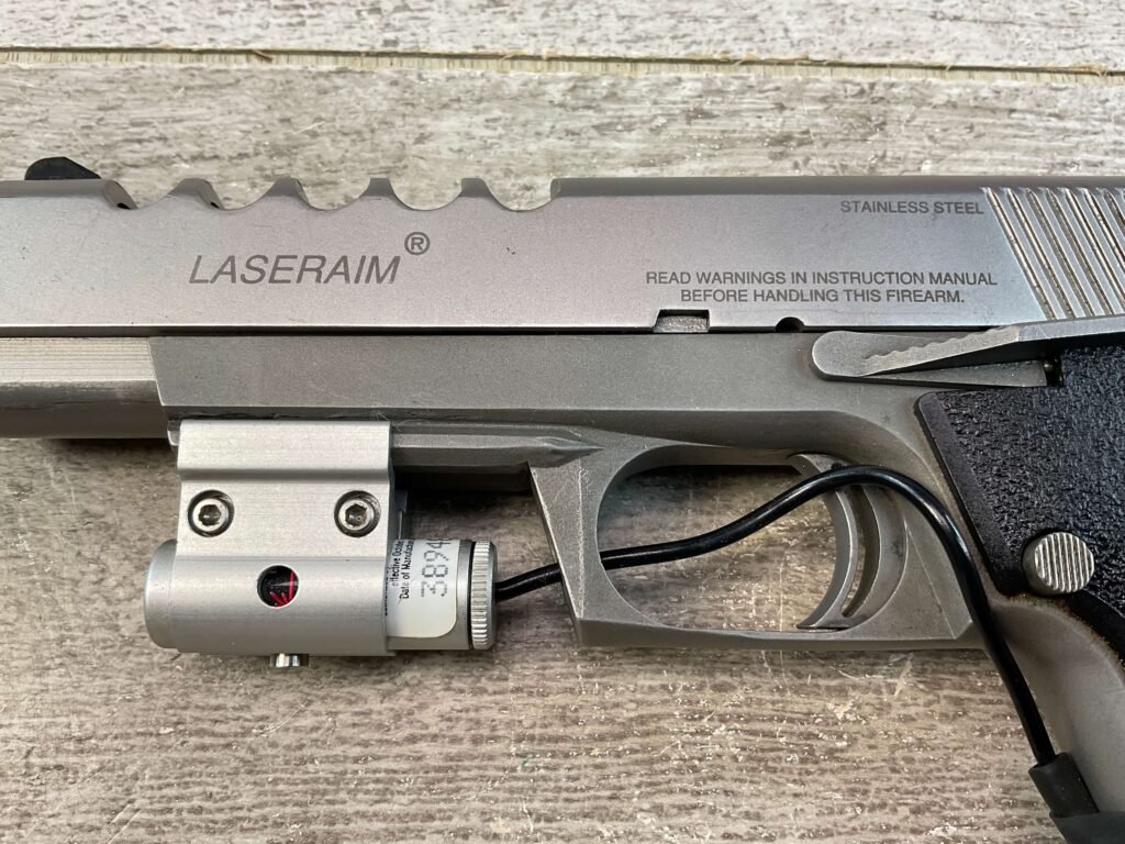 LASERAIM ARMS SERIES III .45 ACP SEMI AUTO STAINLESS PISTOL, JAMES EARL JONES COLLECTION #5-10797