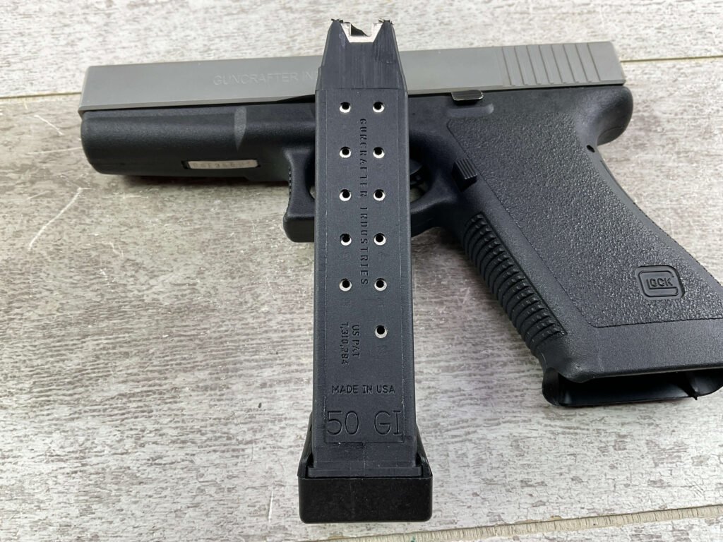 GLOCK MODEL 21 AUST MADE W/ GUNCRAFTER INDUSTRIES 50 GI SEMI AUTO PISTOL, JAMES EARL JONES COLLECTION, CONVERSION KIT & EXTRAS #5-10829