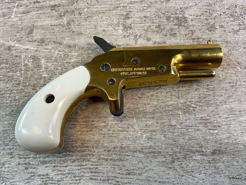 SHOOTERS ARMS .36 CAL BLACK POWDER DERINGER, JAMES EARL JONES COLLECTION, BLACK POWDER #5-10926-PF