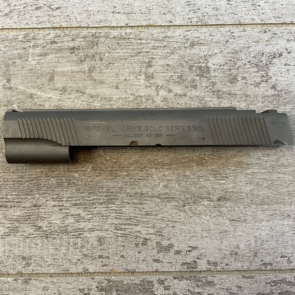 MITCHELL ARMS GOLD SERIES'95, SLIDE, JAMES EARL JONES COLLECTION #5-11695