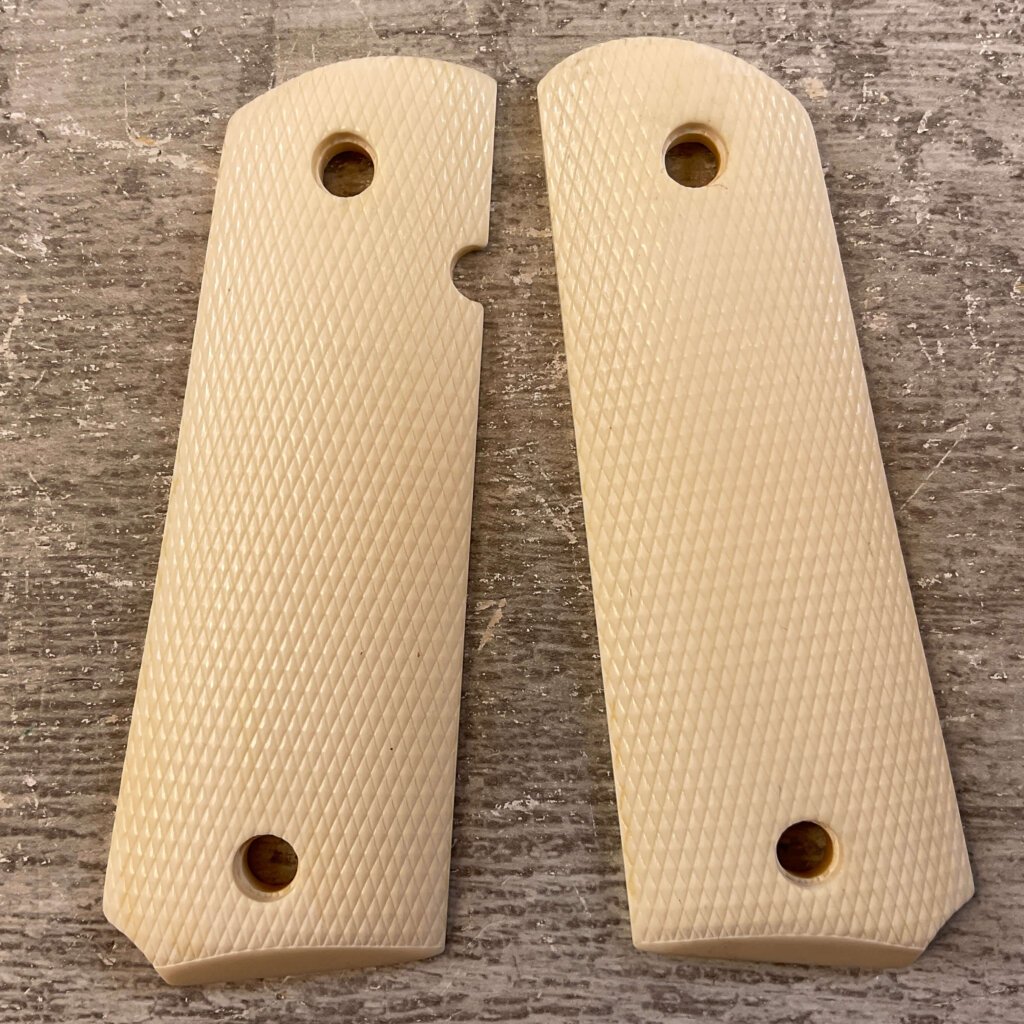 THE BOONE TRADING CO. 1911 SIMULATED IVORY GRIPS, JAMES EARL JONES COLLECTION #5-11626