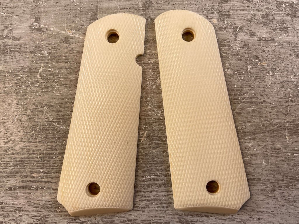 THE BOONE TRADING CO. 1911 SIMULATED IVORY GRIPS, JAMES EARL JONES COLLECTION #5-11626