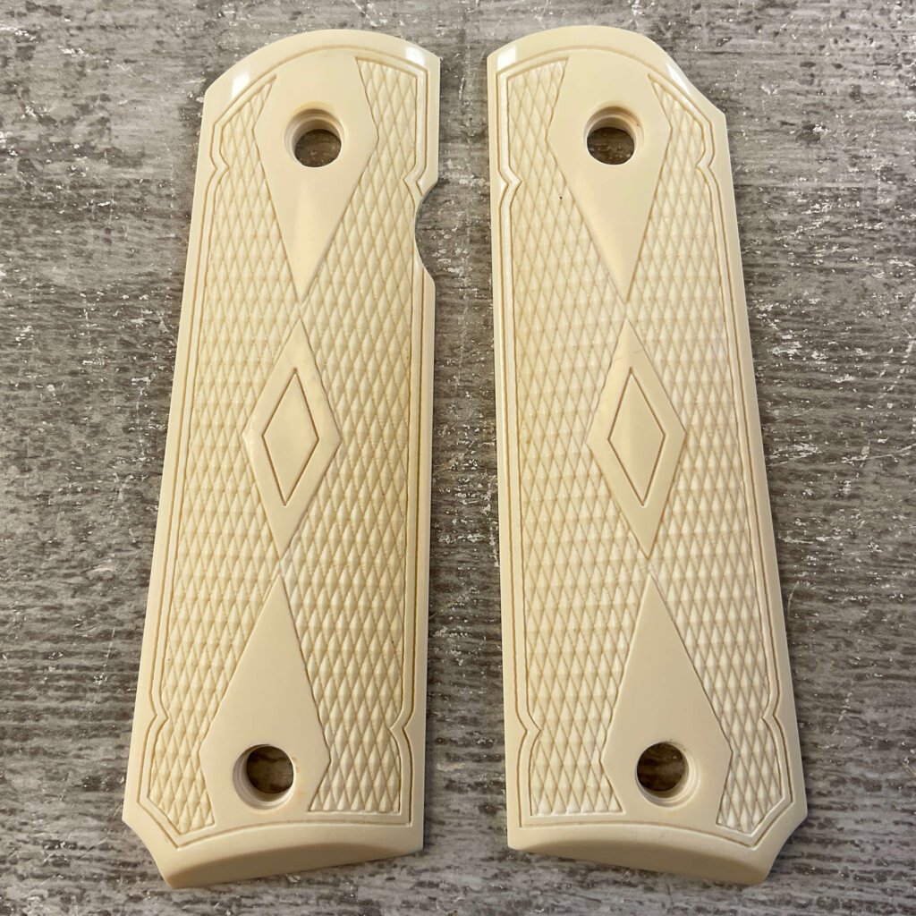 THE BOONE TRADING CO. 1911 SIMULATED IVORY GRIPS, JAMES EARL JONES COLLECTION #5-11719