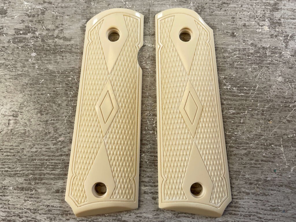 THE BOONE TRADING CO. 1911 SIMULATED IVORY GRIPS, JAMES EARL JONES COLLECTION #5-11719