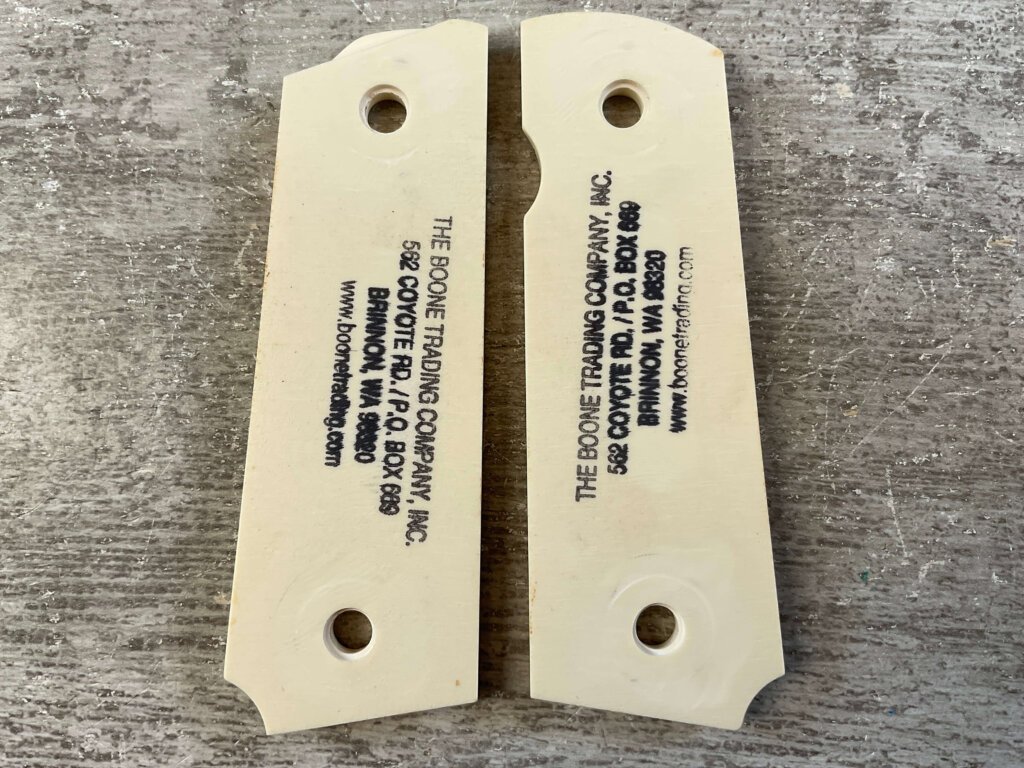 THE BOONE TRADING CO. 1911 SIMULATED IVORY GRIPS, JAMES EARL JONES COLLECTION #5-11719