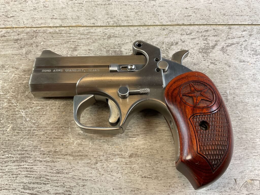 BOND ARMS TEXAS DEFENDER .357 / .38 SPL W/ .22 MAGNUM BARREL LIKE NEW IN BOX