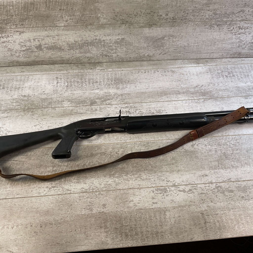 REMINGTON MODEL 1100 12GA SEMI AUTO SHOTGUN W/ COMBAT STOCK #6-05011-PF