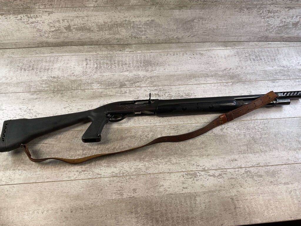 REMINGTON MODEL 1100 12GA SEMI AUTO SHOTGUN W/ COMBAT STOCK #6-05011-PF