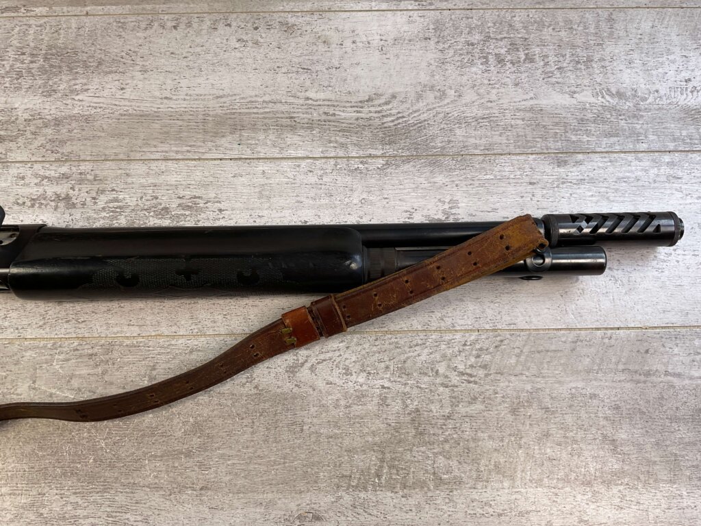 REMINGTON MODEL 1100 12GA SEMI AUTO SHOTGUN W/ COMBAT STOCK #6-05011-PF