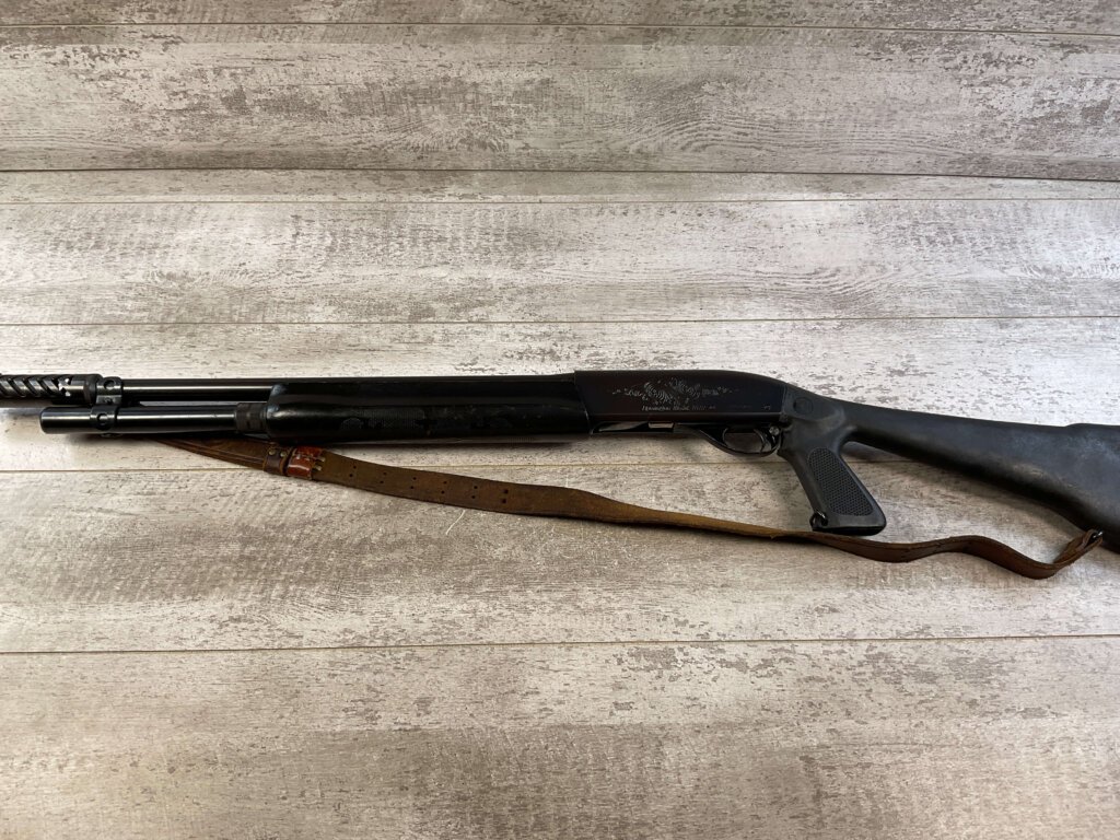 REMINGTON MODEL 1100 12GA SEMI AUTO SHOTGUN W/ COMBAT STOCK #6-05011-PF