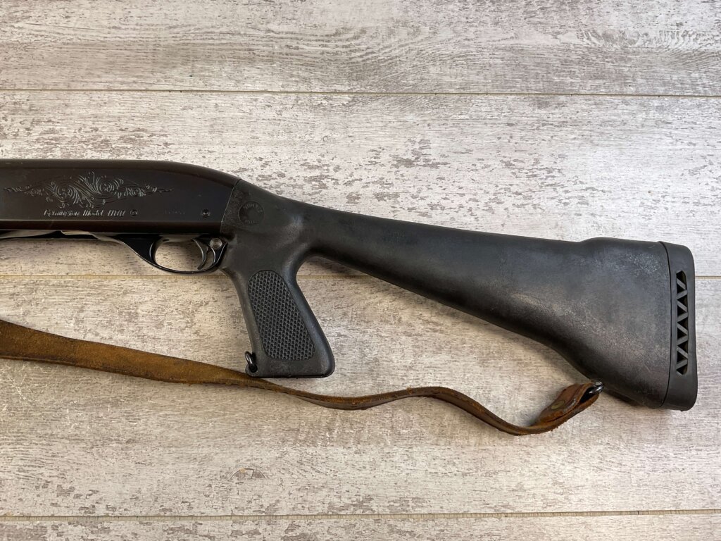 REMINGTON MODEL 1100 12GA SEMI AUTO SHOTGUN W/ COMBAT STOCK #6-05011-PF
