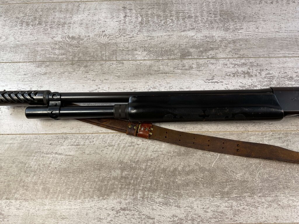 REMINGTON MODEL 1100 12GA SEMI AUTO SHOTGUN W/ COMBAT STOCK #6-05011-PF