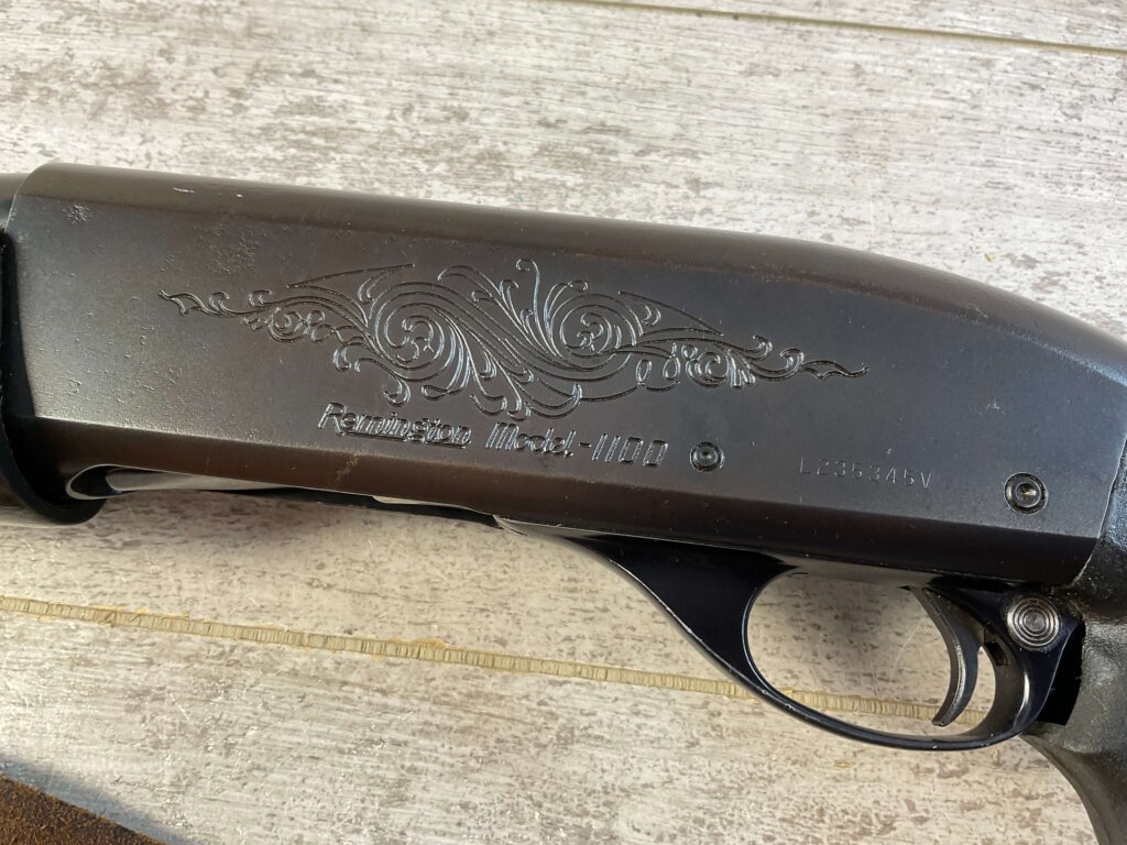 REMINGTON MODEL 1100 12GA SEMI AUTO SHOTGUN W/ COMBAT STOCK #6-05011-PF