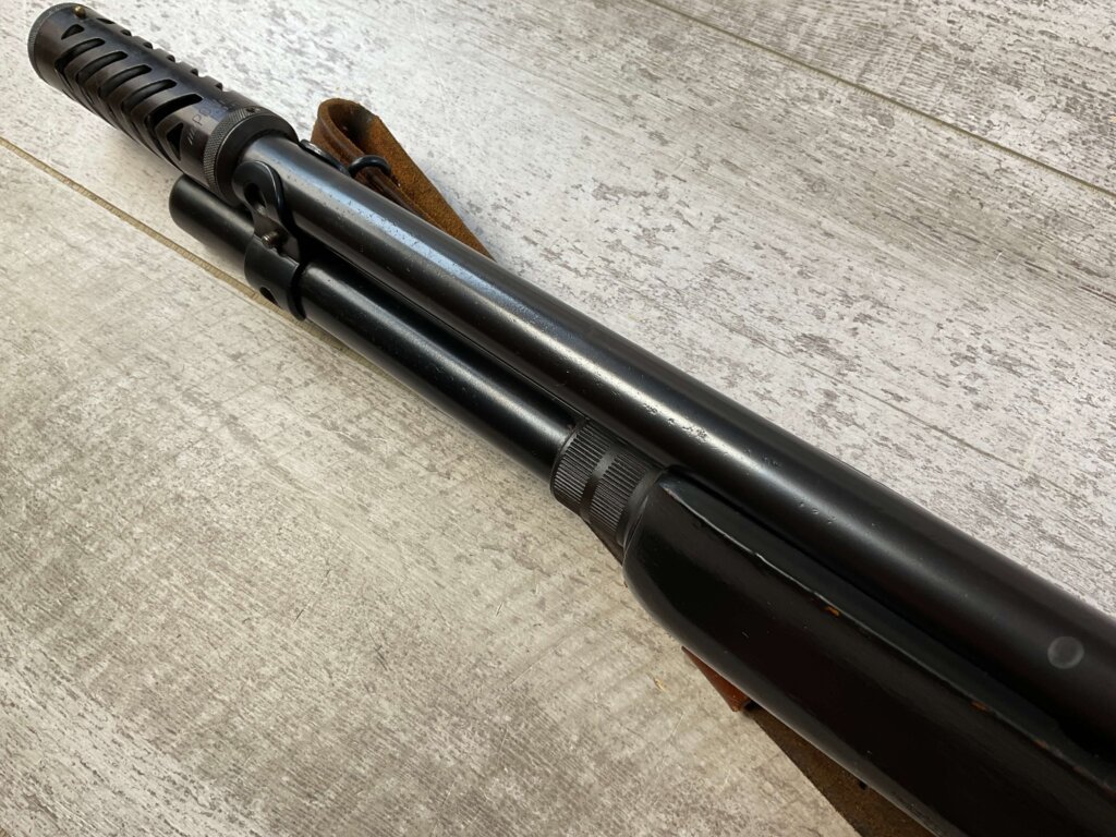 REMINGTON MODEL 1100 12GA SEMI AUTO SHOTGUN W/ COMBAT STOCK #6-05011-PF
