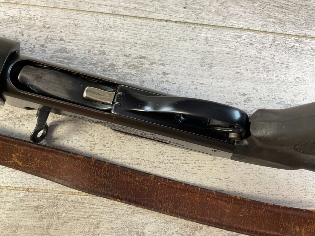 REMINGTON MODEL 1100 12GA SEMI AUTO SHOTGUN W/ COMBAT STOCK #6-05011-PF